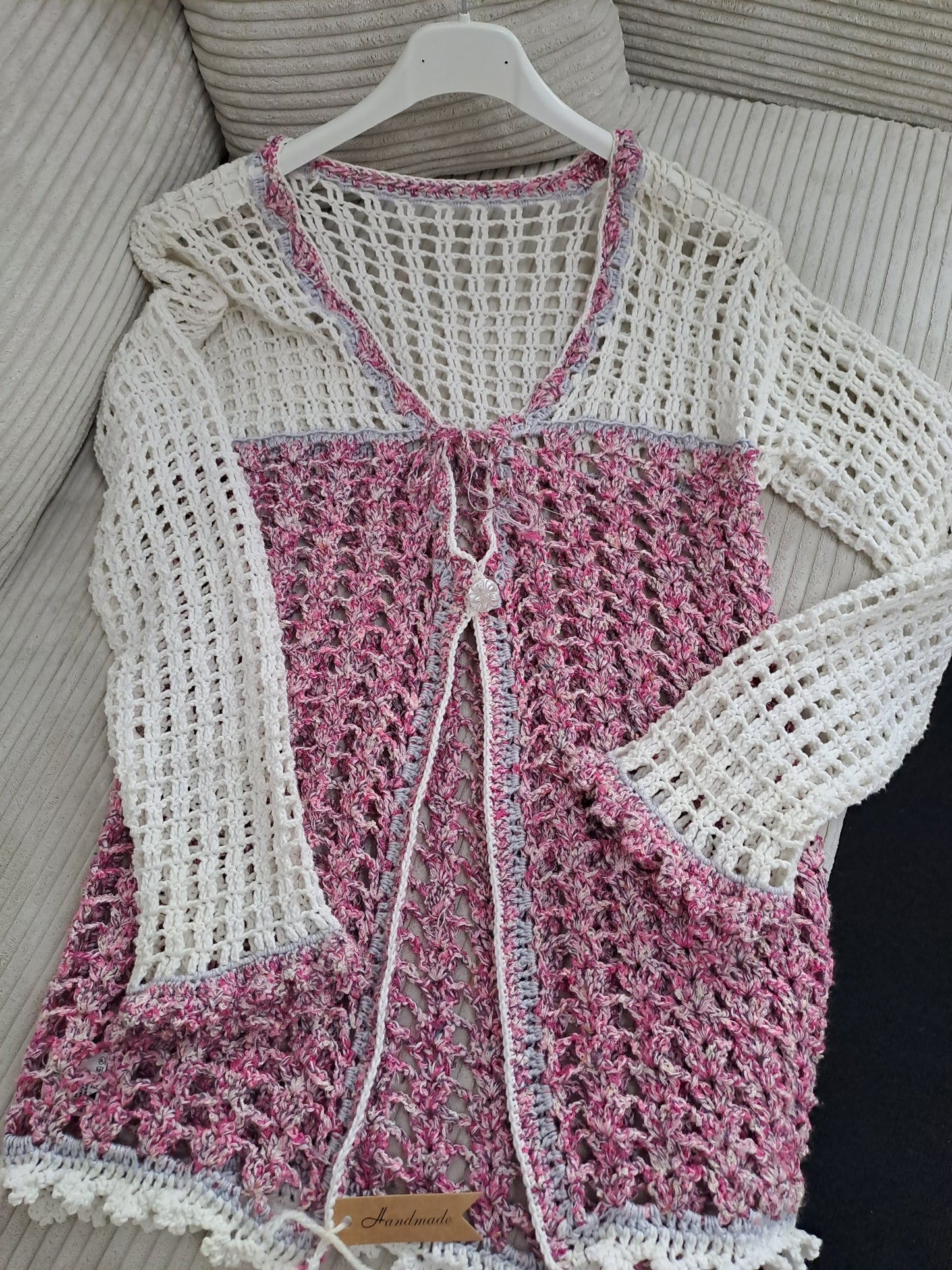 Ružovo biely sveter